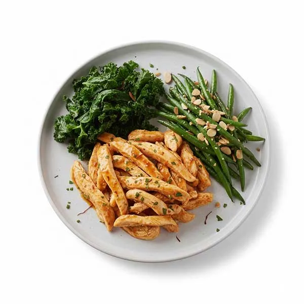 Signature Saffron Tomato Chicken With Wilted Kale & Haricots Verts Almondine